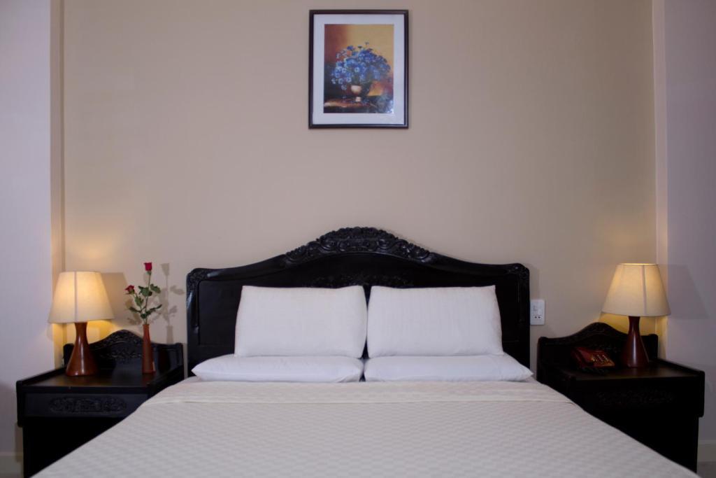 Royal Dragon Boutique Hotel Tan Binh Cidade de Ho Chi Minh Quarto foto