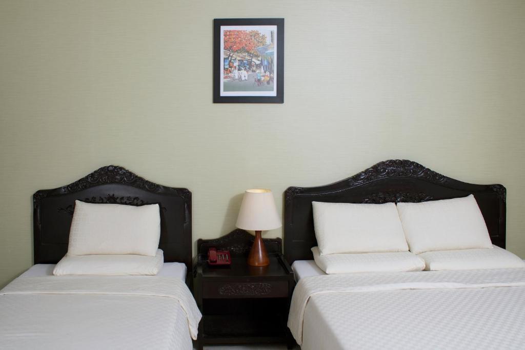 Royal Dragon Boutique Hotel Tan Binh Cidade de Ho Chi Minh Quarto foto