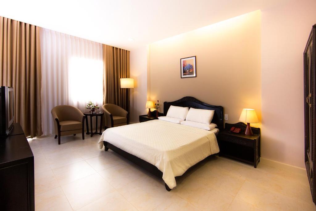 Royal Dragon Boutique Hotel Tan Binh Cidade de Ho Chi Minh Quarto foto