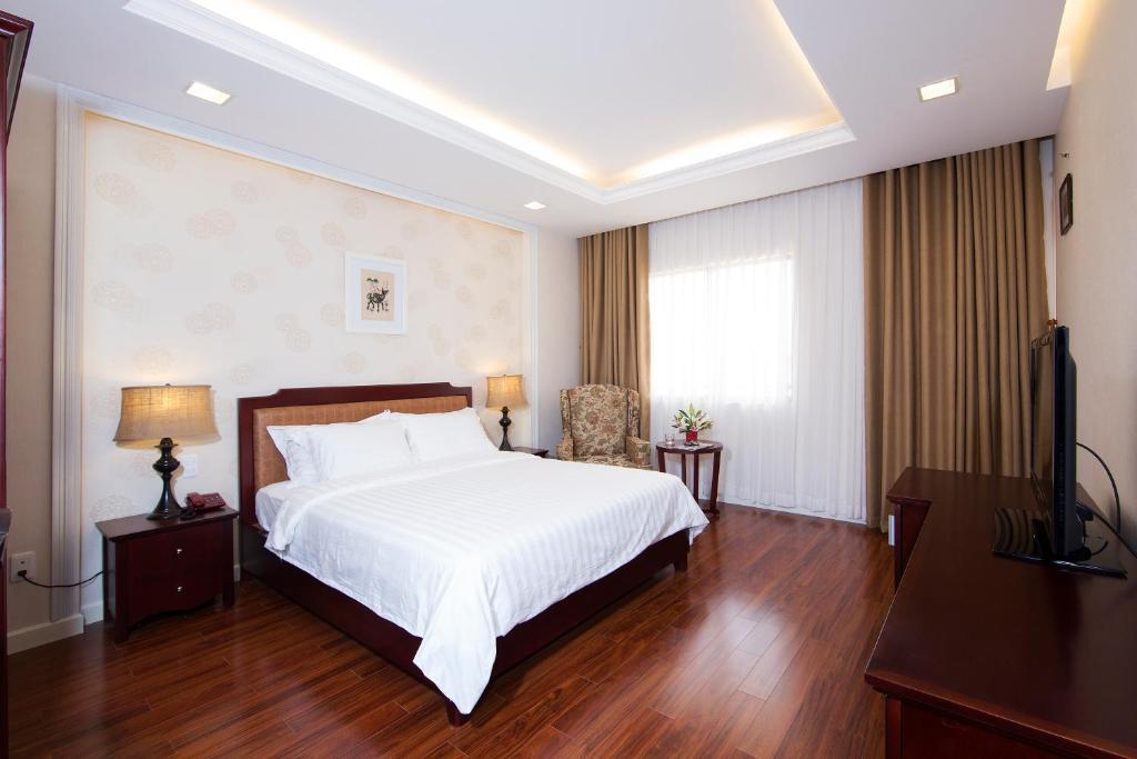 Royal Dragon Boutique Hotel Tan Binh Cidade de Ho Chi Minh Quarto foto